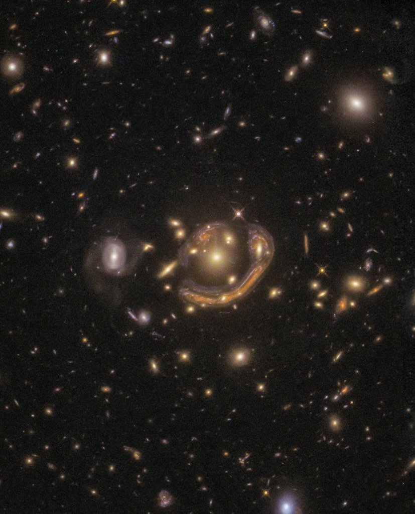 Scientists use rare 'Einstein Cross' to learn about young galaxy with surprisingly old stars