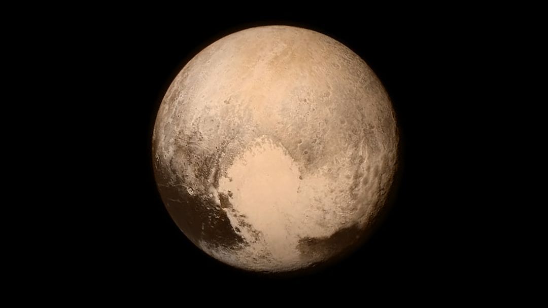 Pluto has glaciers, an atmosphere, and probably an ocean. Why isn’t it a planet?