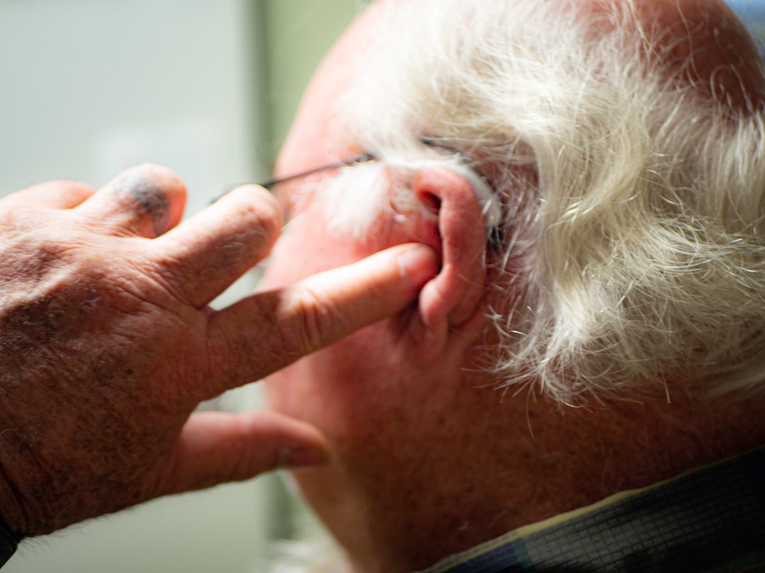 How the Ear-Tapping Technique Is Practiced (Image Credits: Unsplash)