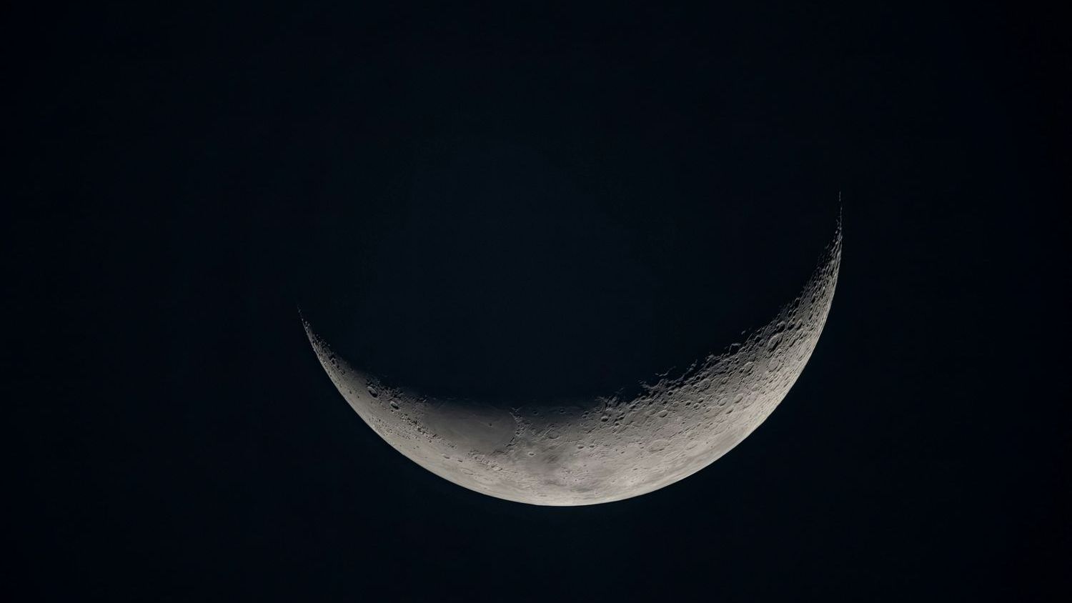 NASA's Artemis 2 commander and astrophotographer team up to capture breathtaking, never-before-seen shots of the moon's far side