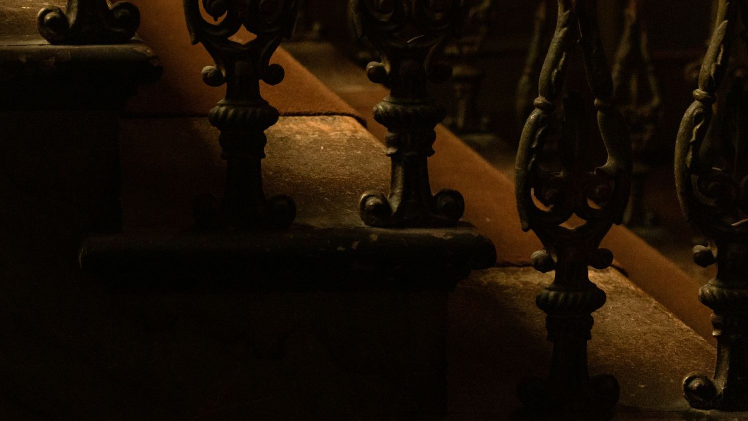 How did a wealthy widow wind up dead below a staircase in her mansion?